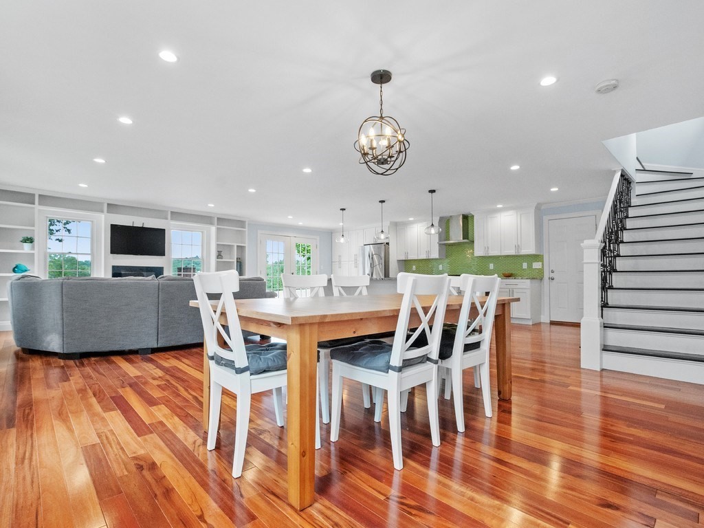 1767 Trapelo Road Waltham, MA 02451 - Photo 12 of 39 a view of a dining room with furniture and wooden floor