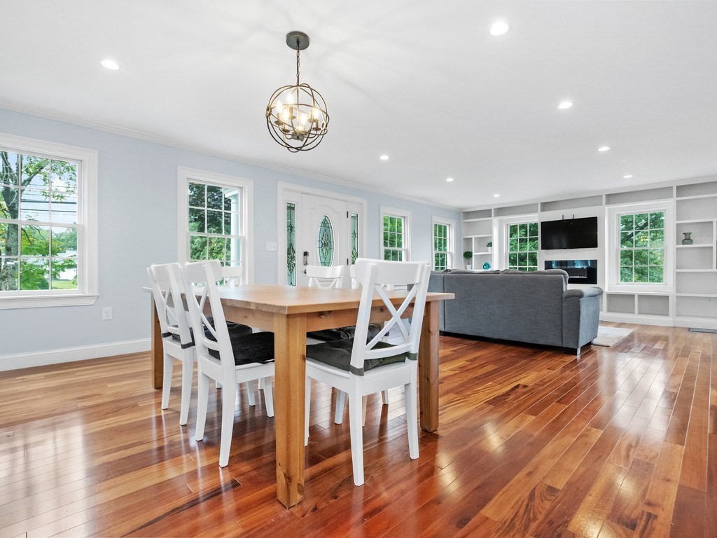 1767 Trapelo Road Waltham, MA 02451 - Photo 13 of 39 a view of a dining room with furniture window and wooden floor