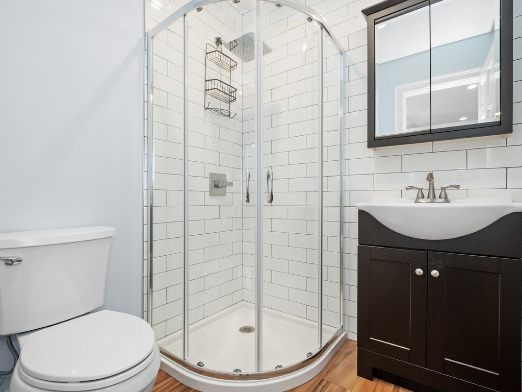 1767 Trapelo Road Waltham, MA 02451 - Photo 14 of 39 a bathroom with a sink and a mirror