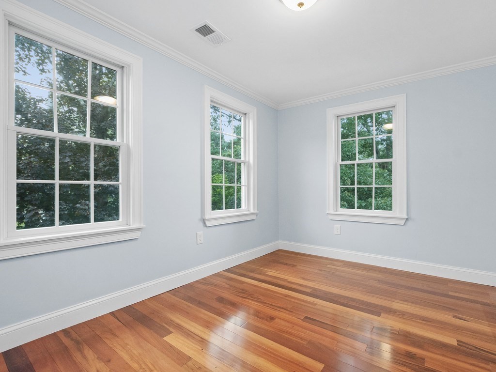 1767 Trapelo Road Waltham, MA 02451 - Photo 20 of 39 a view of an empty room with a window