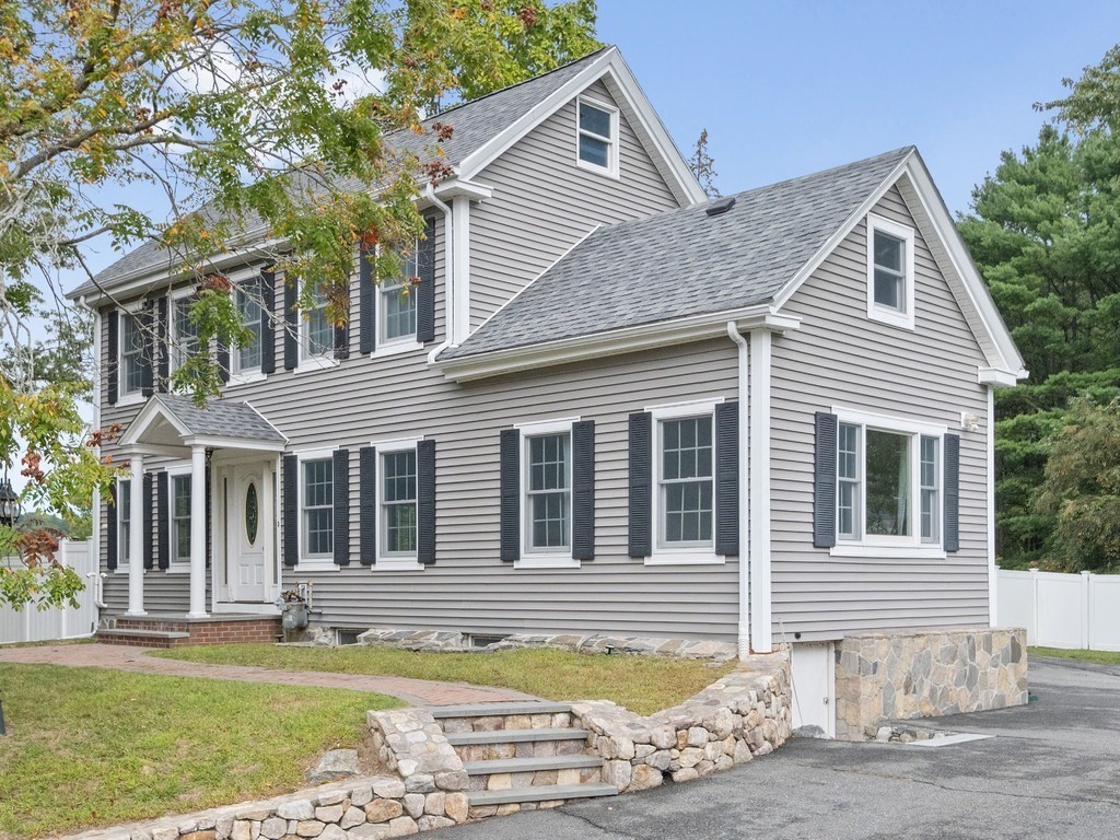 1767 Trapelo Road Waltham, MA 02451 - Photo 2 of 39 a front view of a house with a yard