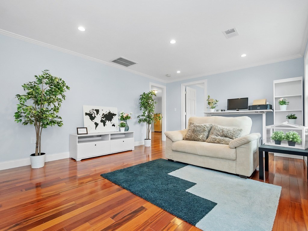 1767 Trapelo Road Waltham, MA 02451 - Photo 22 of 39 a living room with furniture and a potted plant