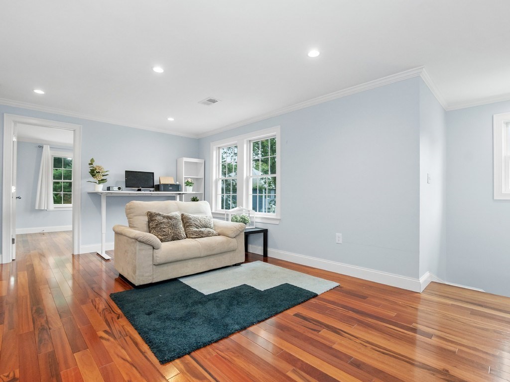 1767 Trapelo Road Waltham, MA 02451 - Photo 23 of 39 a living room with furniture and a wooden floor