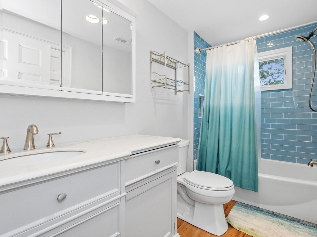 1767 Trapelo Road Waltham, MA 02451 - Photo 27 of 39 a bathroom with a sink a toilet and a bathtub