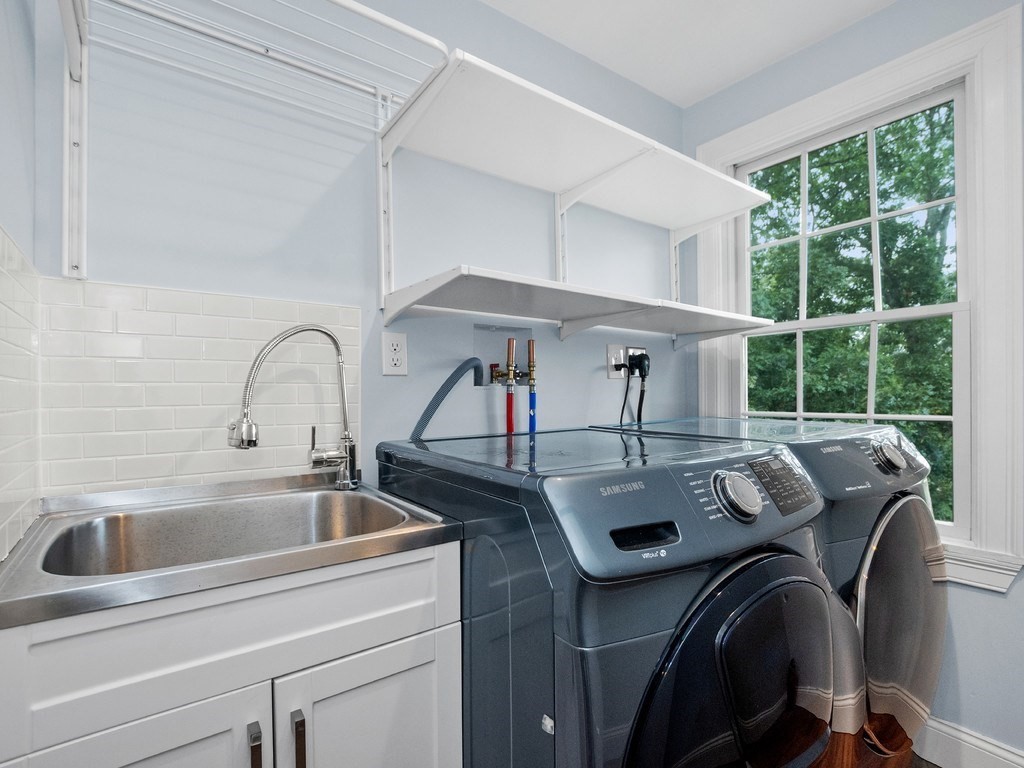 1767 Trapelo Road Waltham, MA 02451 - Photo 29 of 39 a kitchen with a sink a stove and furniture