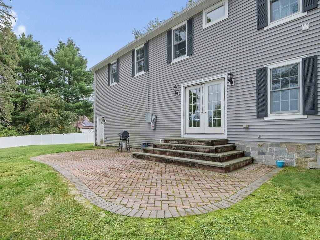 1767 Trapelo Road Waltham, MA 02451 - Photo 32 of 39 a front view of a house with a yard