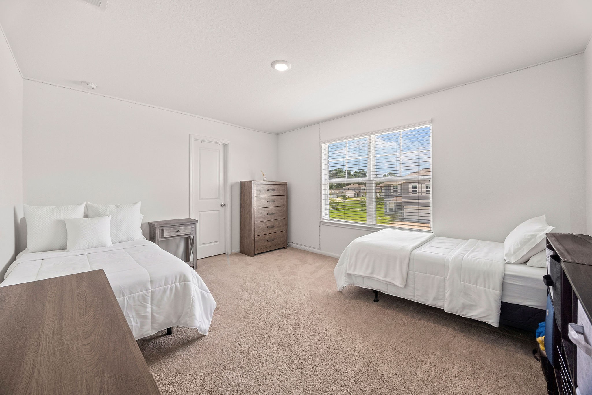 23334 Simmental Road Hockley, TX 77447 - Photo 23 of 38 Bedroom 4 offers ample space, making it perfect for bunk beds or a larger furniture arrangement.