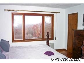 300 Upper Ridgeview Road Columbus, NC 28722 - Photo 7 of 12 a view of a room with a large window