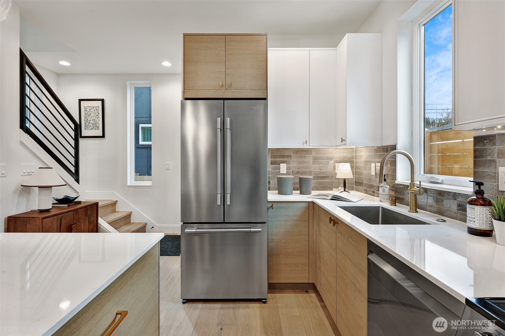 2006 B 19th Avenue South Seattle, WA 98144 - Photo 12 of 32 a kitchen with a refrigerator and a sink