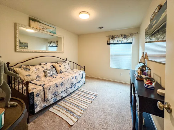 a room with furniture and a window