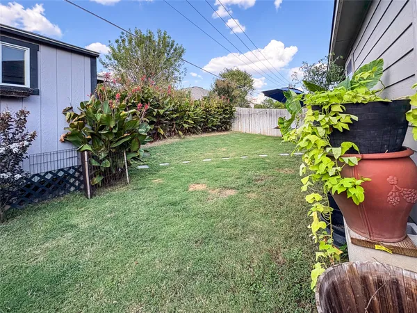a view of a backyard with a garden