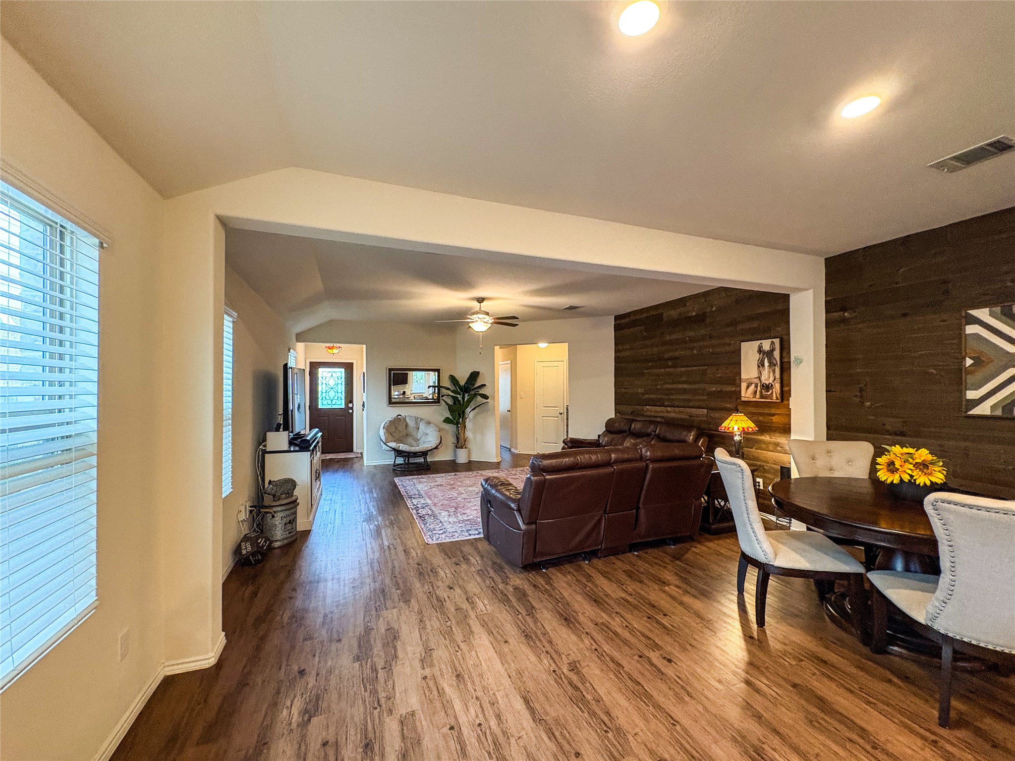 307 Andesite Trail Buda, TX 78610 - Photo 19 of 19 a living room with furniture and a wooden floor
