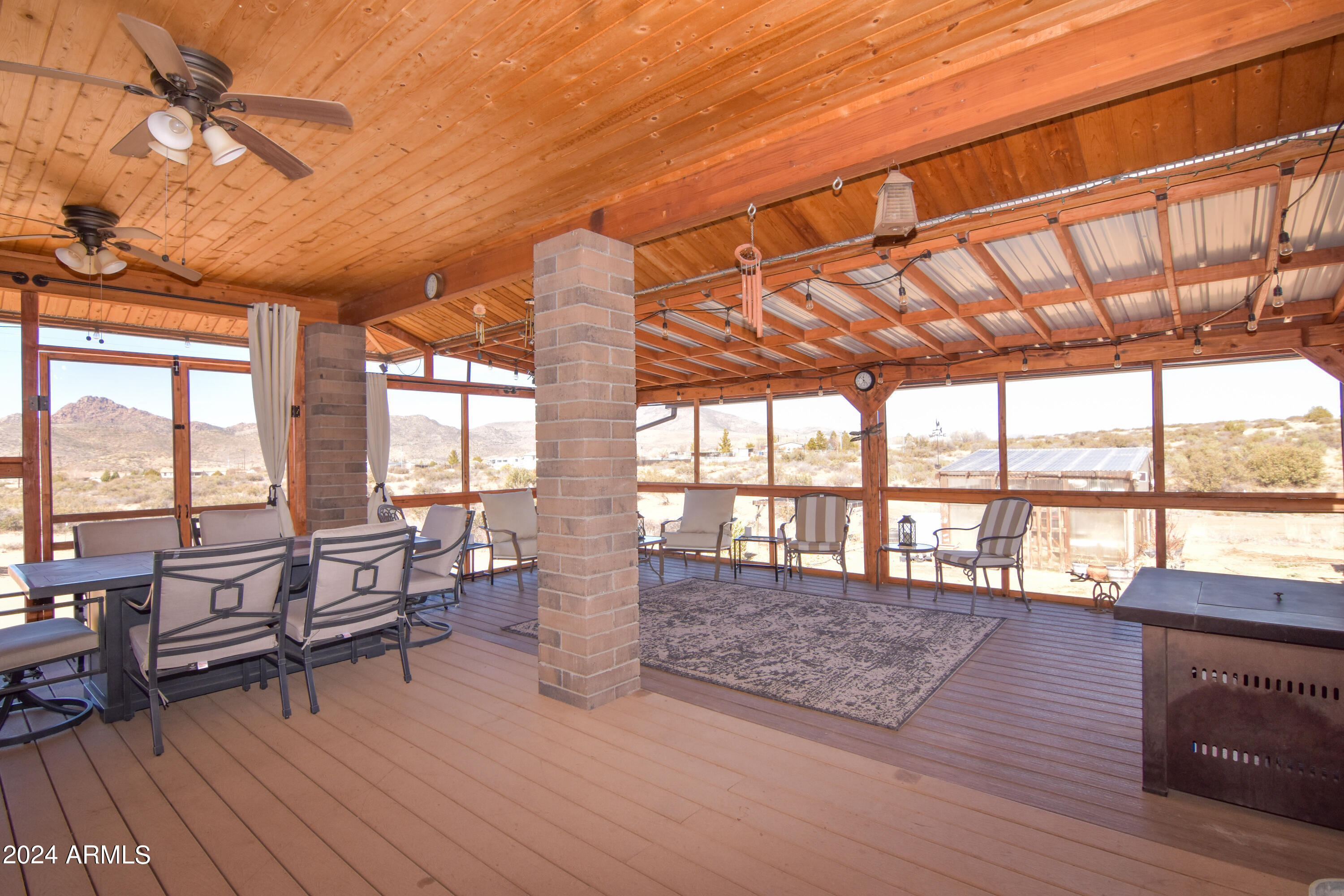 6951 Musgrove Road Skull Valley, AZ 86338 - Photo 28 of 52 Large covered and screened in back porch