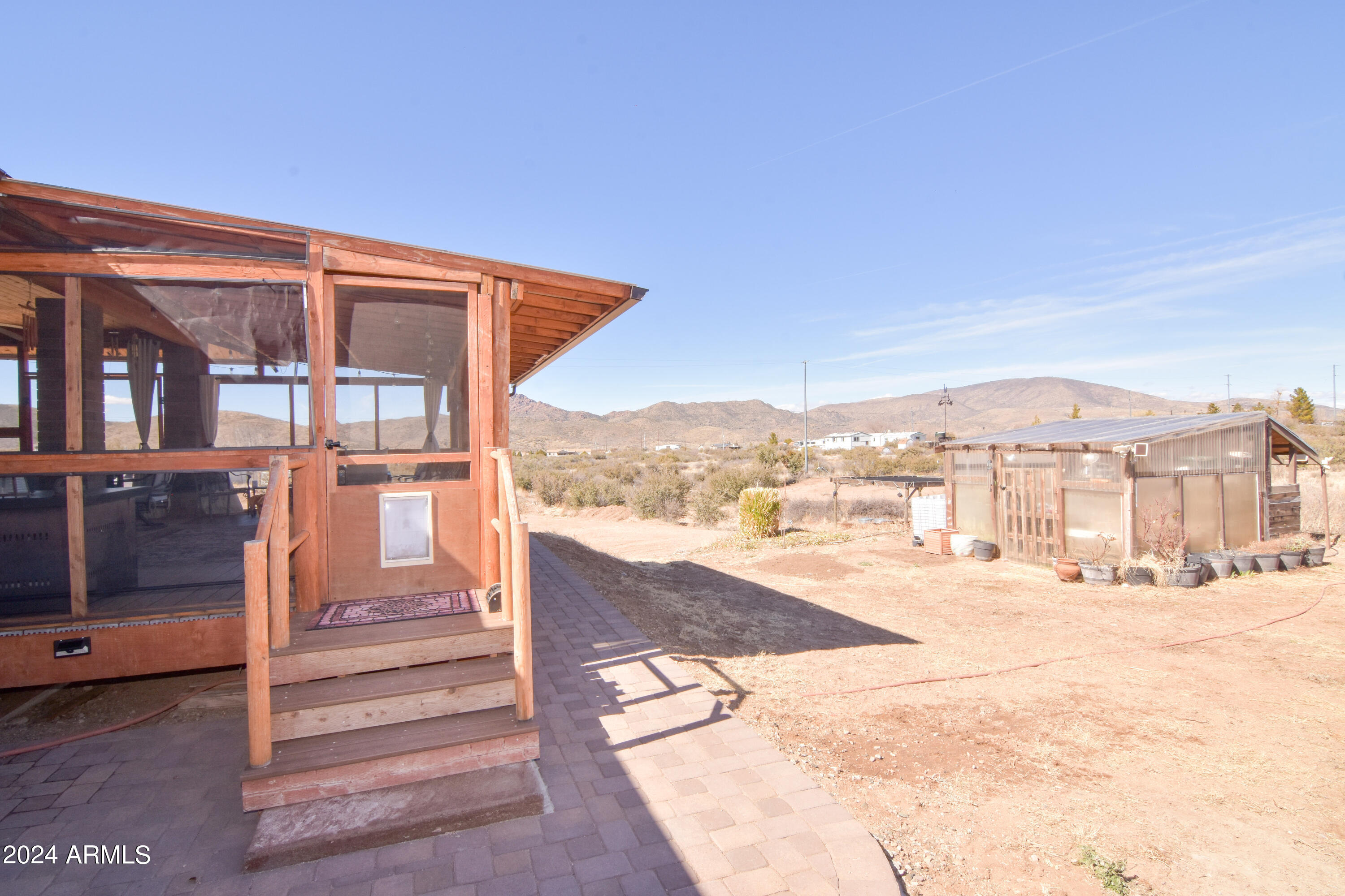 6951 Musgrove Road Skull Valley, AZ 86338 - Photo 36 of 52 View of the porch from the paver patio
