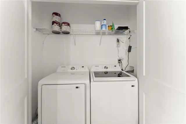 a utility room with dryer and washer