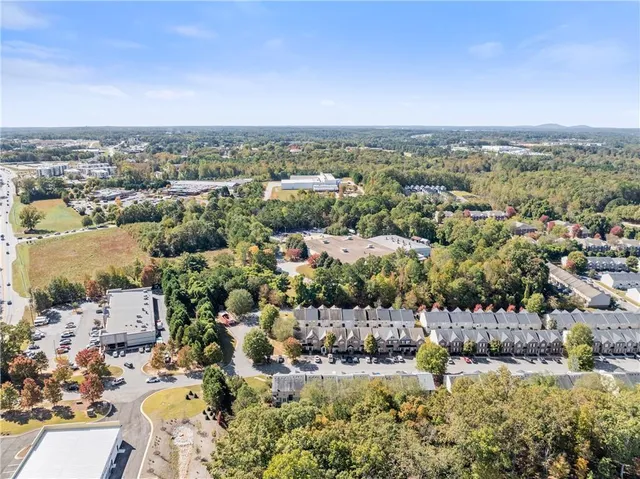 an aerial view of a city with lots of residential buildings