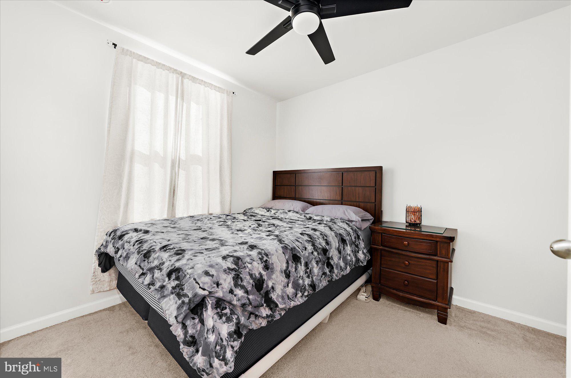 39 Wendowski Street Beverly, NJ 08010 - Photo 17 of 25 a bedroom with a bed and a window