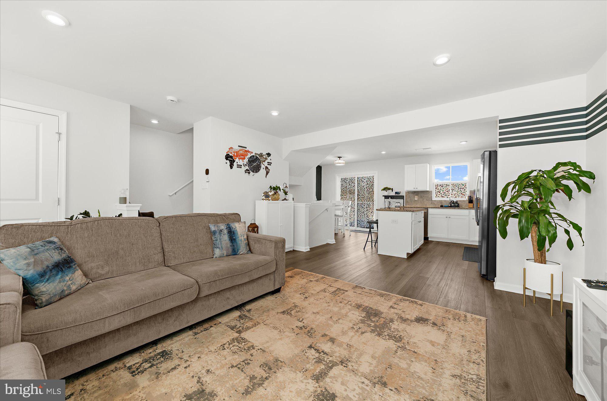 39 Wendowski Street Beverly, NJ 08010 - Photo 2 of 25 a living room with furniture and wooden floor