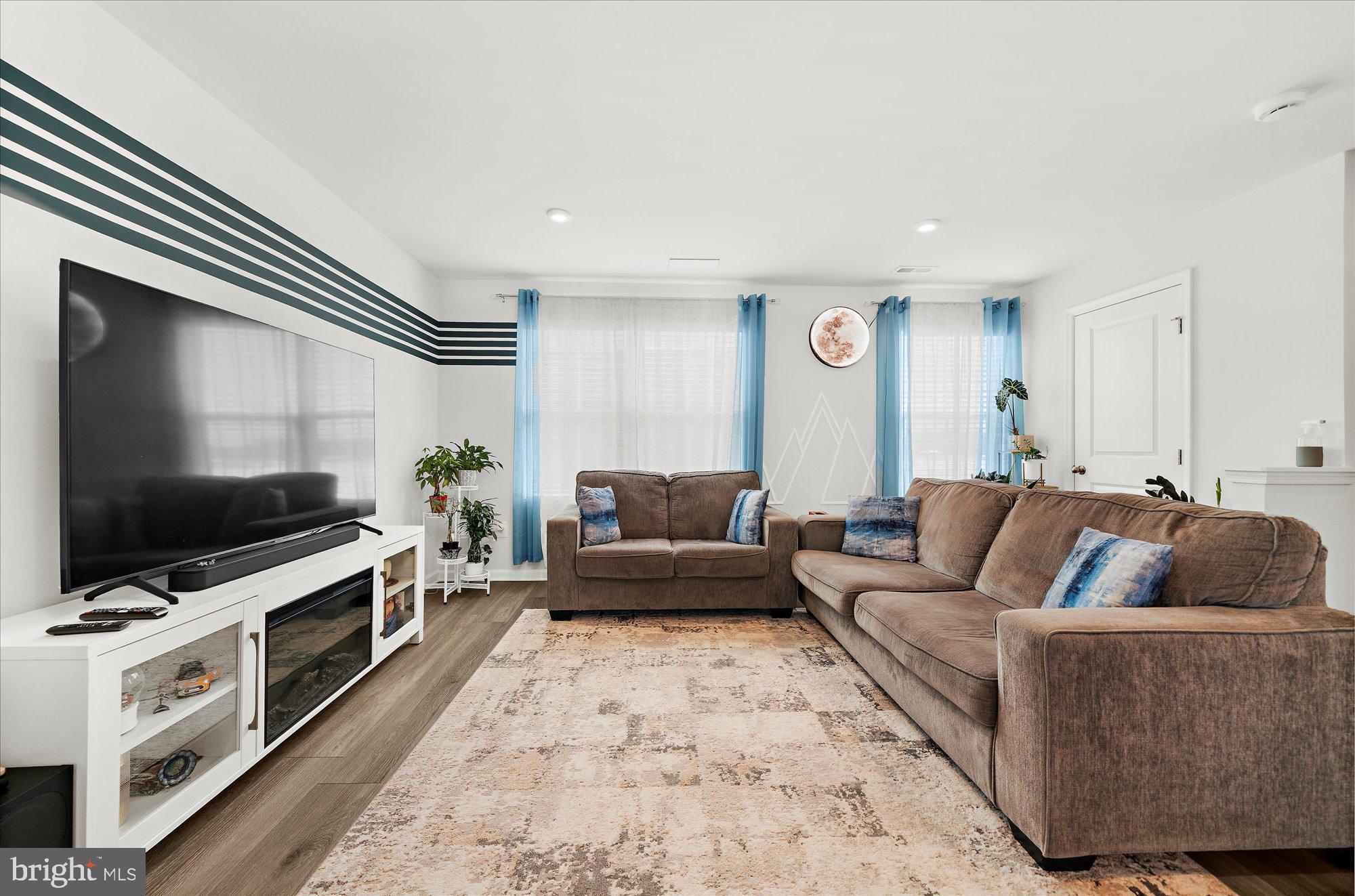 39 Wendowski Street Beverly, NJ 08010 - Photo 6 of 25 a living room with furniture and a flat screen tv