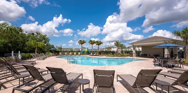 a view of yard with patio