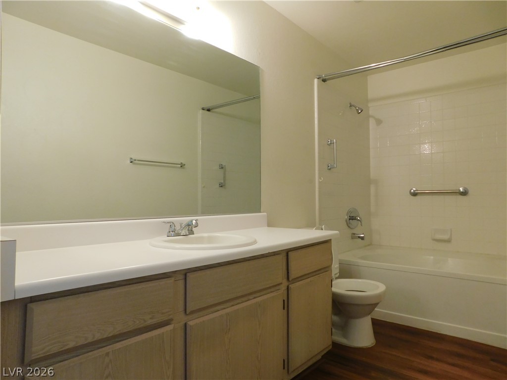 5221 South Lindell Road, Unit 202 Las Vegas, NV 89118 - Photo 18 of 28 Functional bathroom featuring a vanity with ample counter space and a full shower-tub combination.