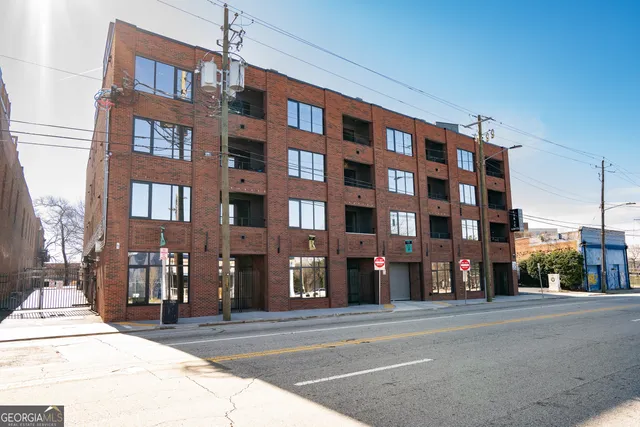 a city street lined with tall buildings