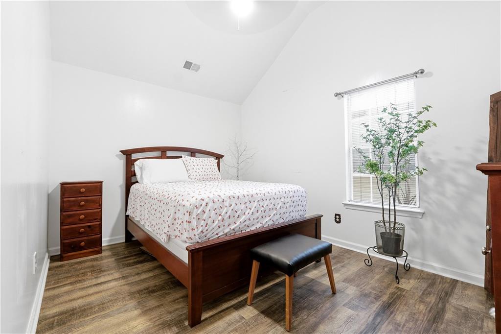 20 Ivans Circle Covington, GA 30016 - Photo 26 of 29 a bedroom with a bed table and a window