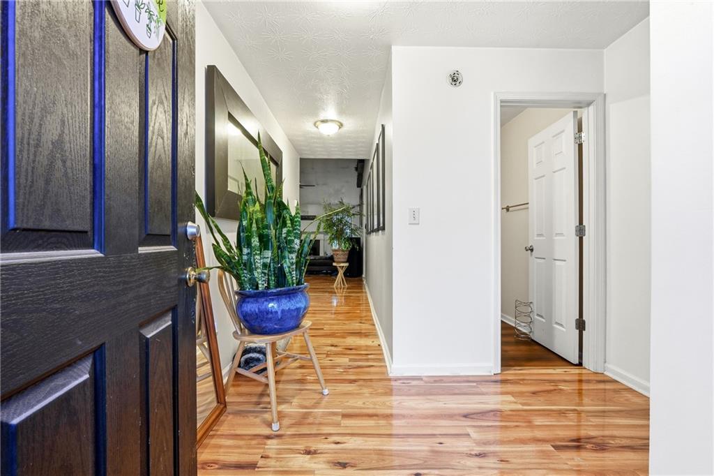 20 Ivans Circle Covington, GA 30016 - Photo 3 of 29 a view of a hallway with dining area and glass door