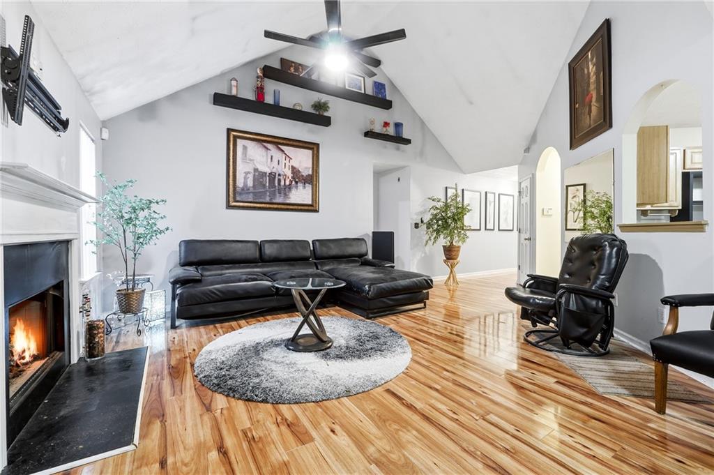 20 Ivans Circle Covington, GA 30016 - Photo 9 of 29 a living room with furniture and a fireplace