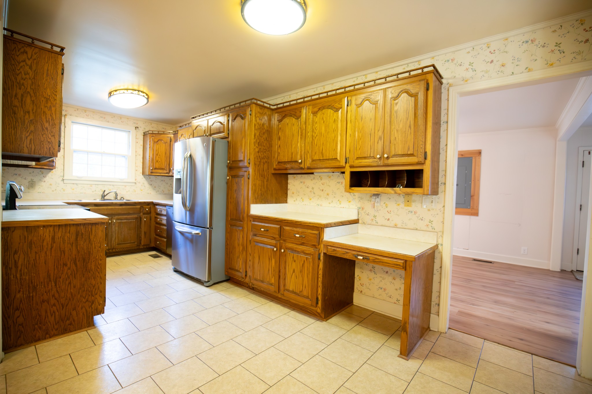 709 Nix Pass Madison, TN 37115 - Photo 12 of 33 a kitchen with stainless steel appliances a sink counter space and a window