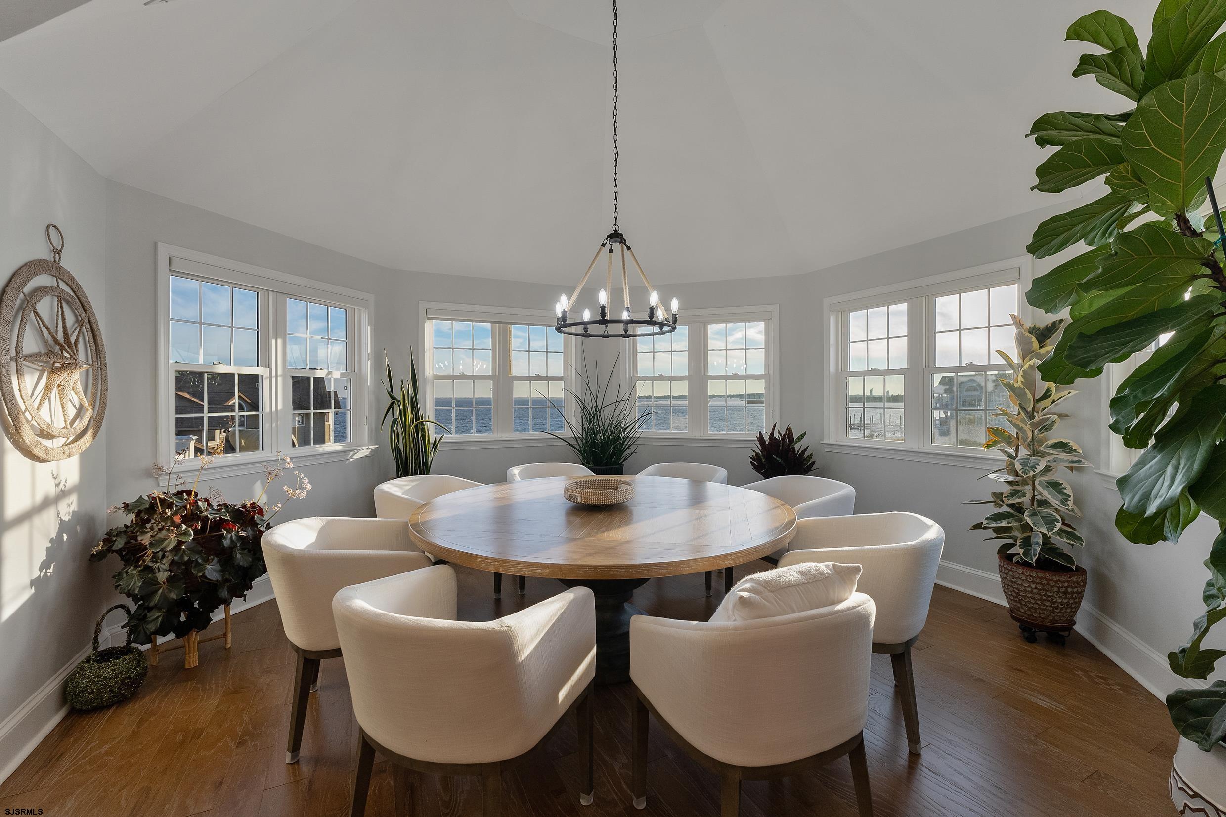 102 Broadway, Unit 2 Somers Point, NJ 08244 - Photo 29 of 98 a dining room with furniture window and wooden floor