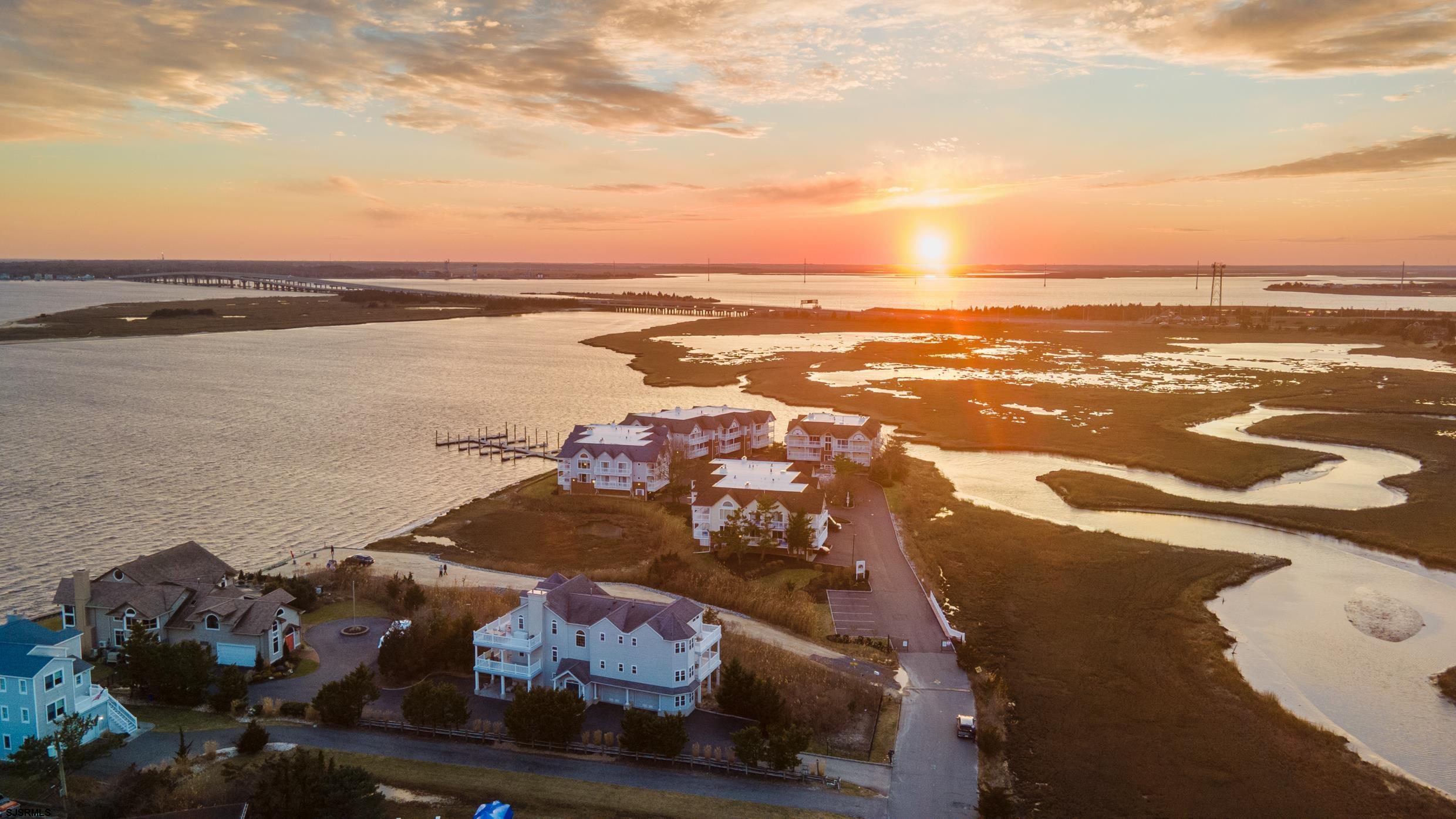 102 Broadway, Unit 2 Somers Point, NJ 08244 - Photo 91 of 98 an aerial view of ocean beach and residential houses with outdoor space