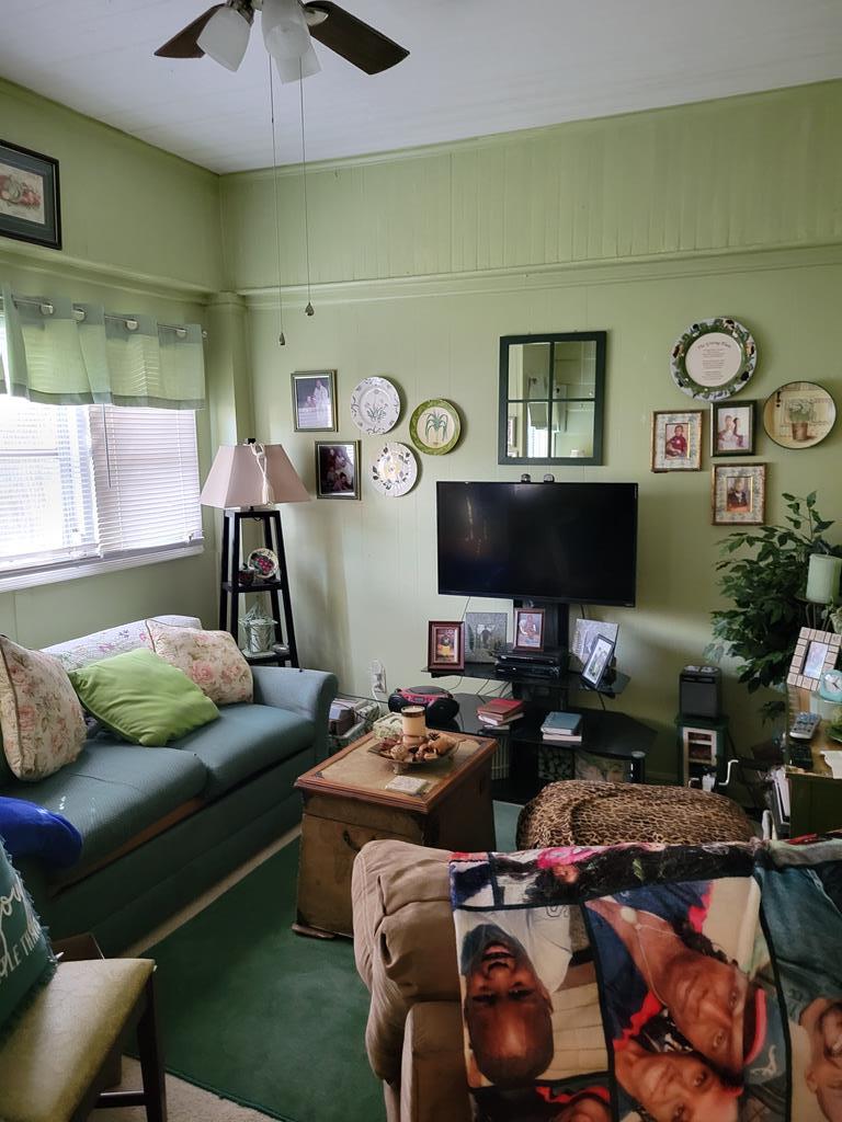 2512 19th Avenue Columbus, GA 31901 - Photo 3 of 9 a living room with furniture and a fireplace
