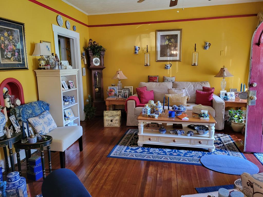 2512 19th Avenue Columbus, GA 31901 - Photo 4 of 9 a living room with furniture and wooden floor