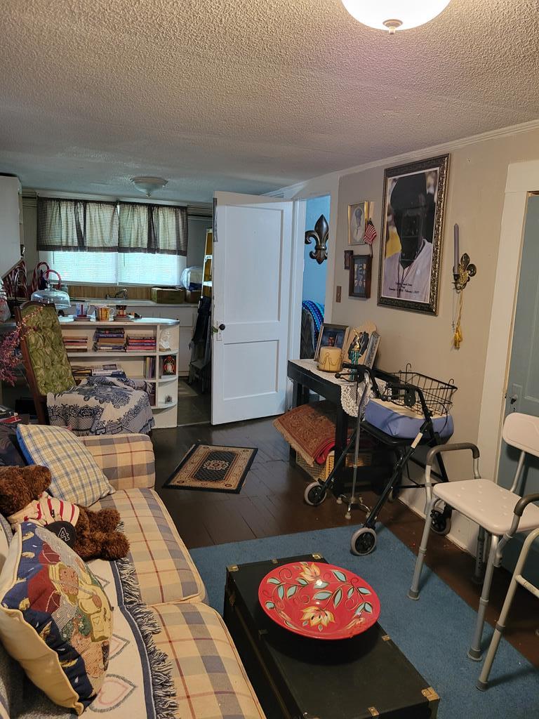 2512 19th Avenue Columbus, GA 31901 - Photo 8 of 9 a room with furniture and gym equipment