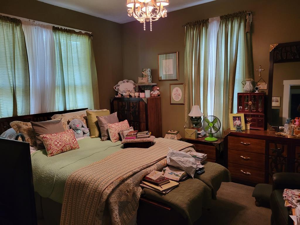 2512 19th Avenue Columbus, GA 31901 - Photo 9 of 9 a bedroom with bed furniture and a large window