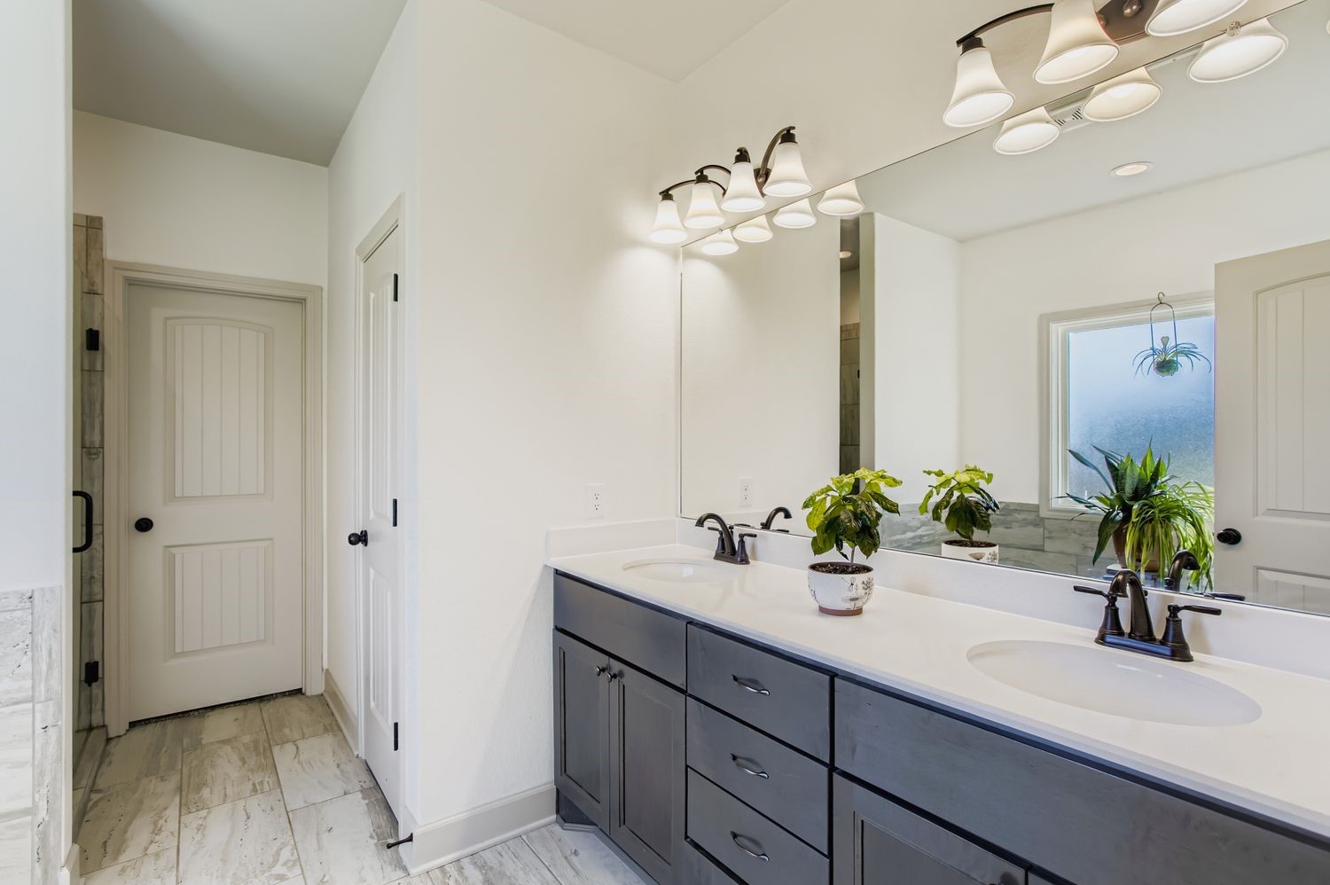 32123 Howell Road Waller, TX 77484 - Photo 17 of 28 a bathroom with a sink double vanity and a mirror