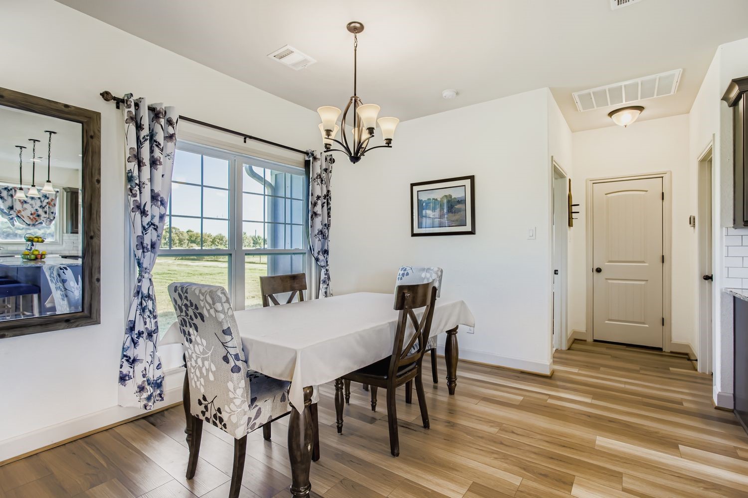 32123 Howell Road Waller, TX 77484 - Photo 10 of 28 a view of a dining room with furniture window and wooden floor