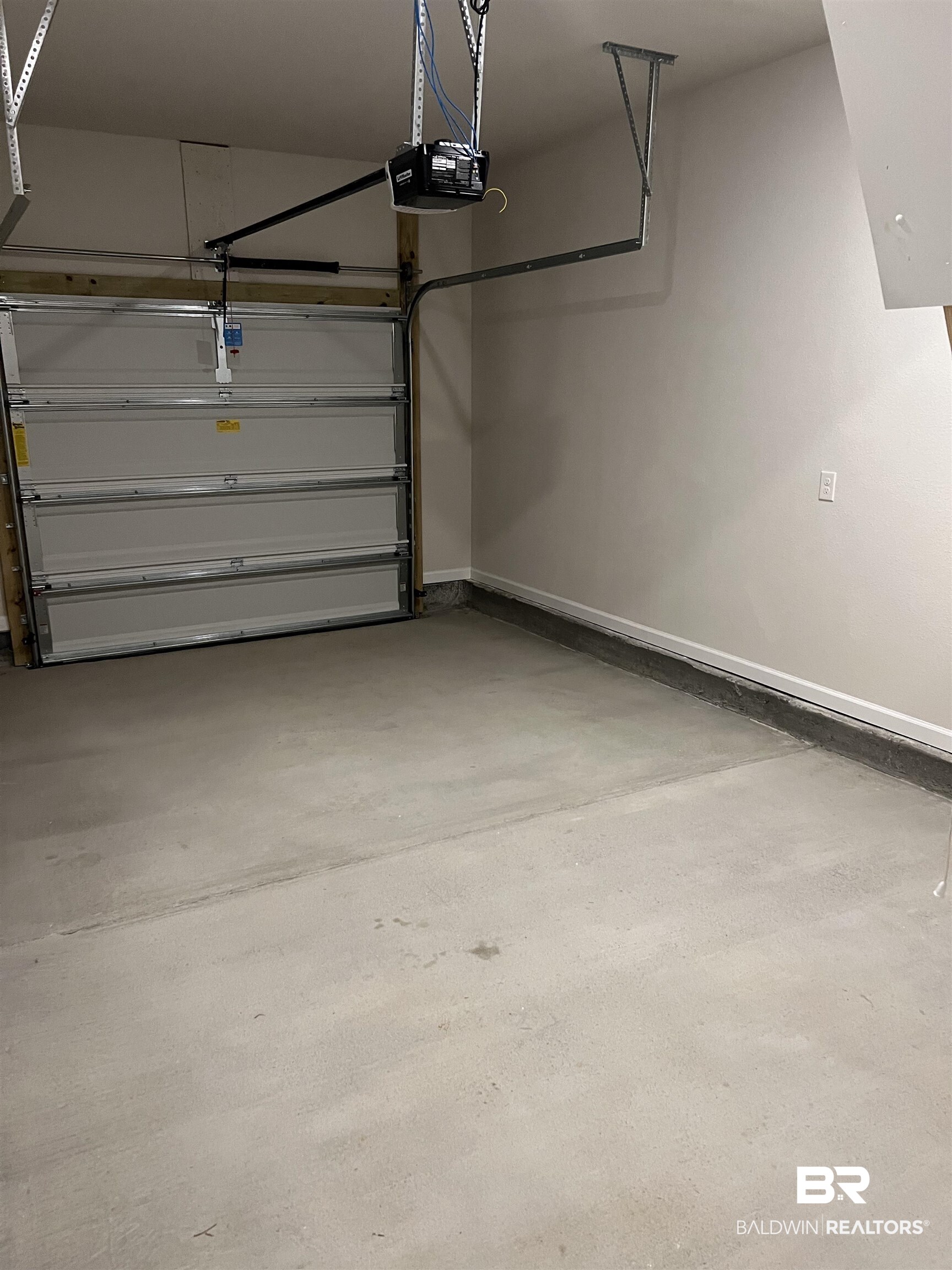 12829 Patriot Way Daphne, AL 36527 - Photo 30 of 38 Garage with a garage door opener