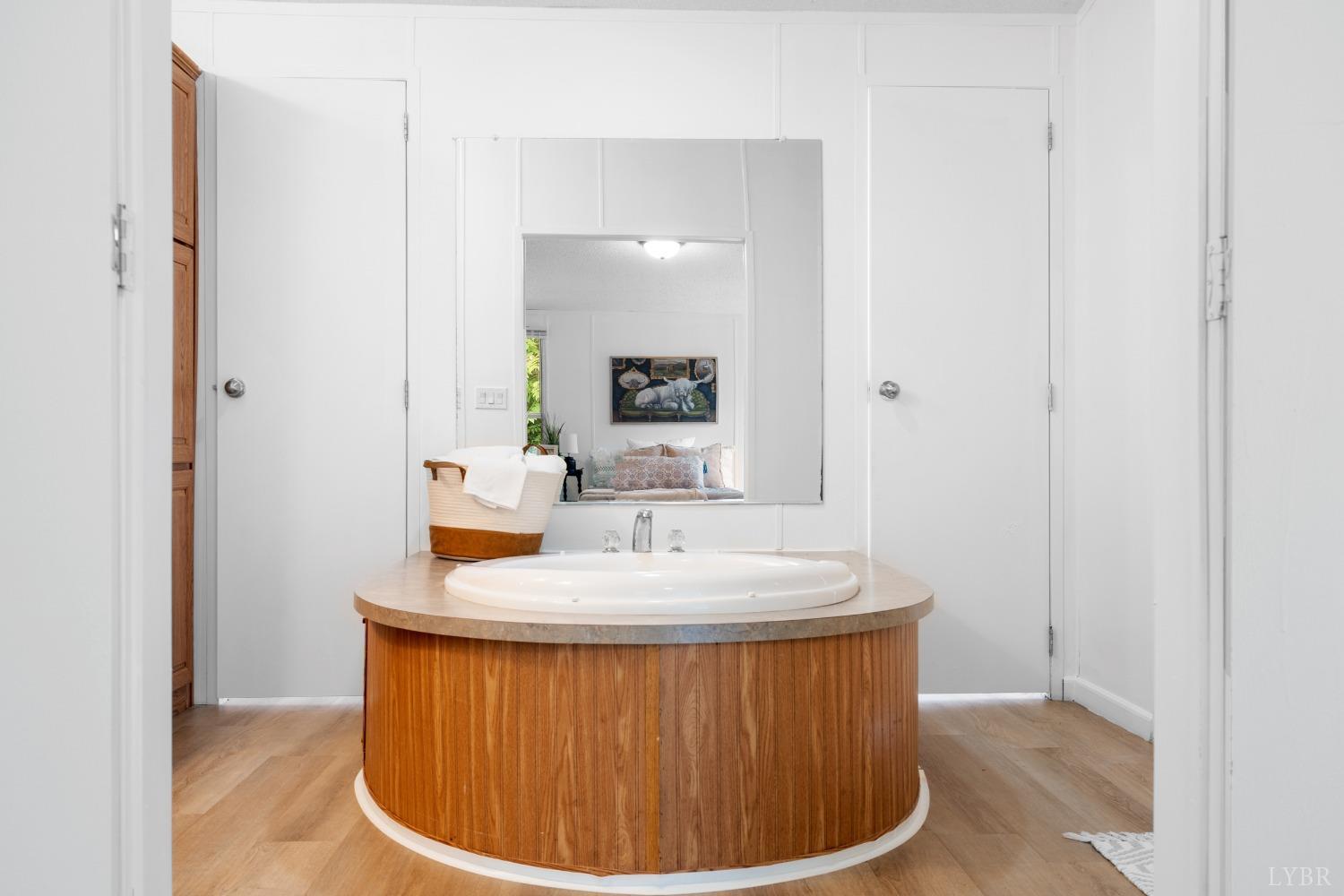 128 Douglas Drive Dry Fork, VA 24549 - Photo 24 of 45 a bathroom with a sink and a mirror