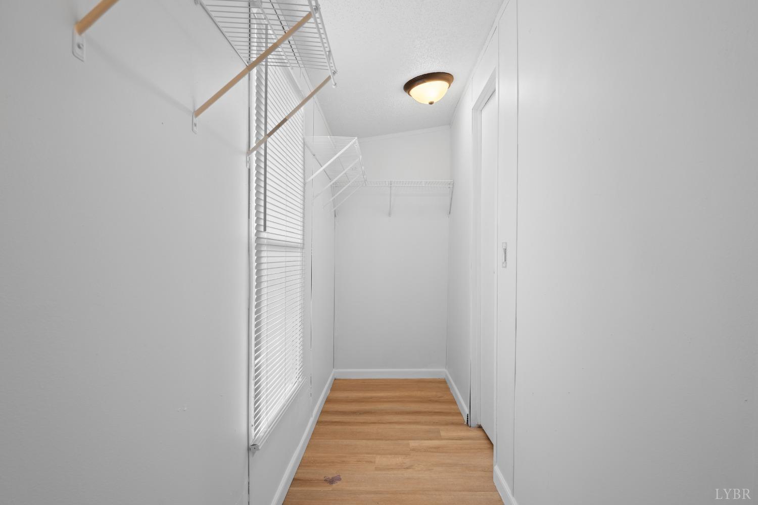 128 Douglas Drive Dry Fork, VA 24549 - Photo 25 of 45 a view of a hallway with wooden floor
