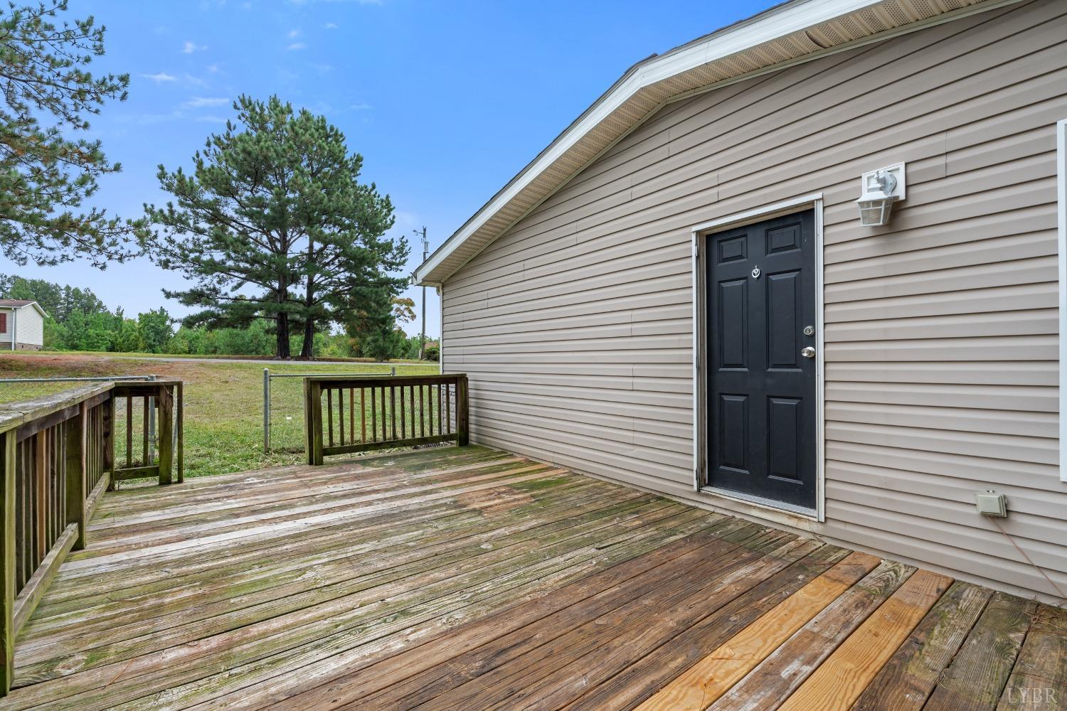 128 Douglas Drive Dry Fork, VA 24549 - Photo 36 of 45 a view of a wooden deck