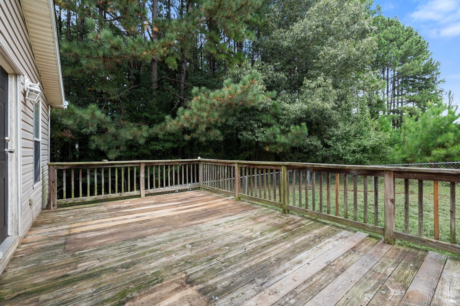 128 Douglas Drive Dry Fork, VA 24549 - Photo 37 of 45 a balcony with wooden floor and fence