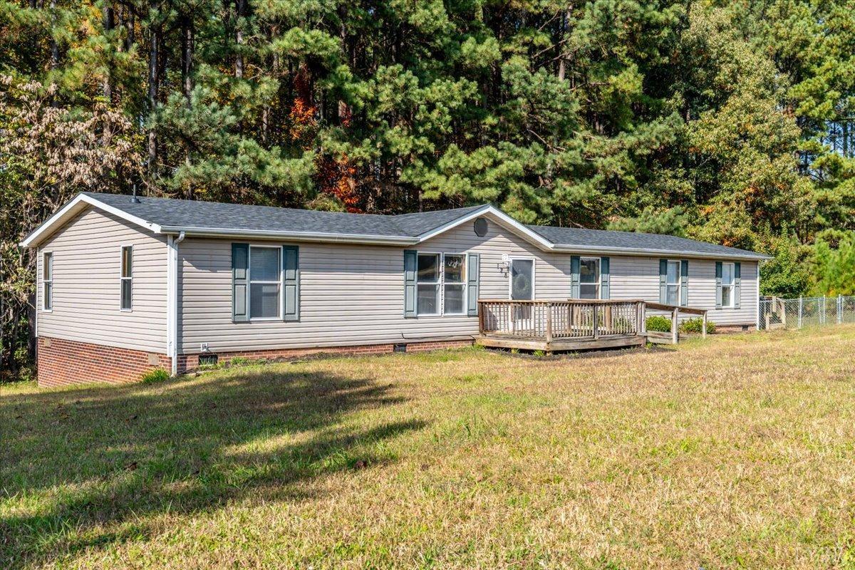 128 Douglas Drive Dry Fork, VA 24549 - Photo 40 of 45 a view of a house with a yard and large tree