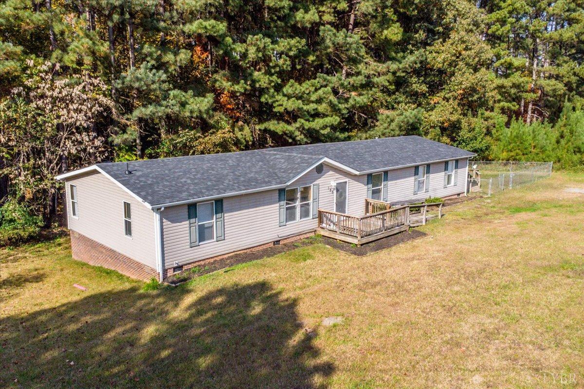 128 Douglas Drive Dry Fork, VA 24549 - Photo 41 of 45 a aerial view of a house with yard and roof
