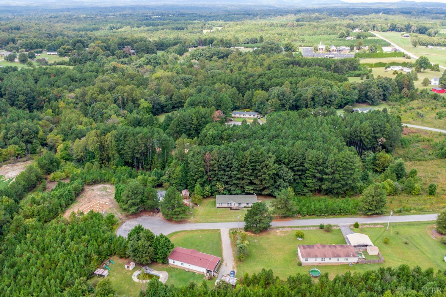 128 Douglas Drive Dry Fork, VA 24549 - Photo 44 of 45 an aerial view of a house with a yard