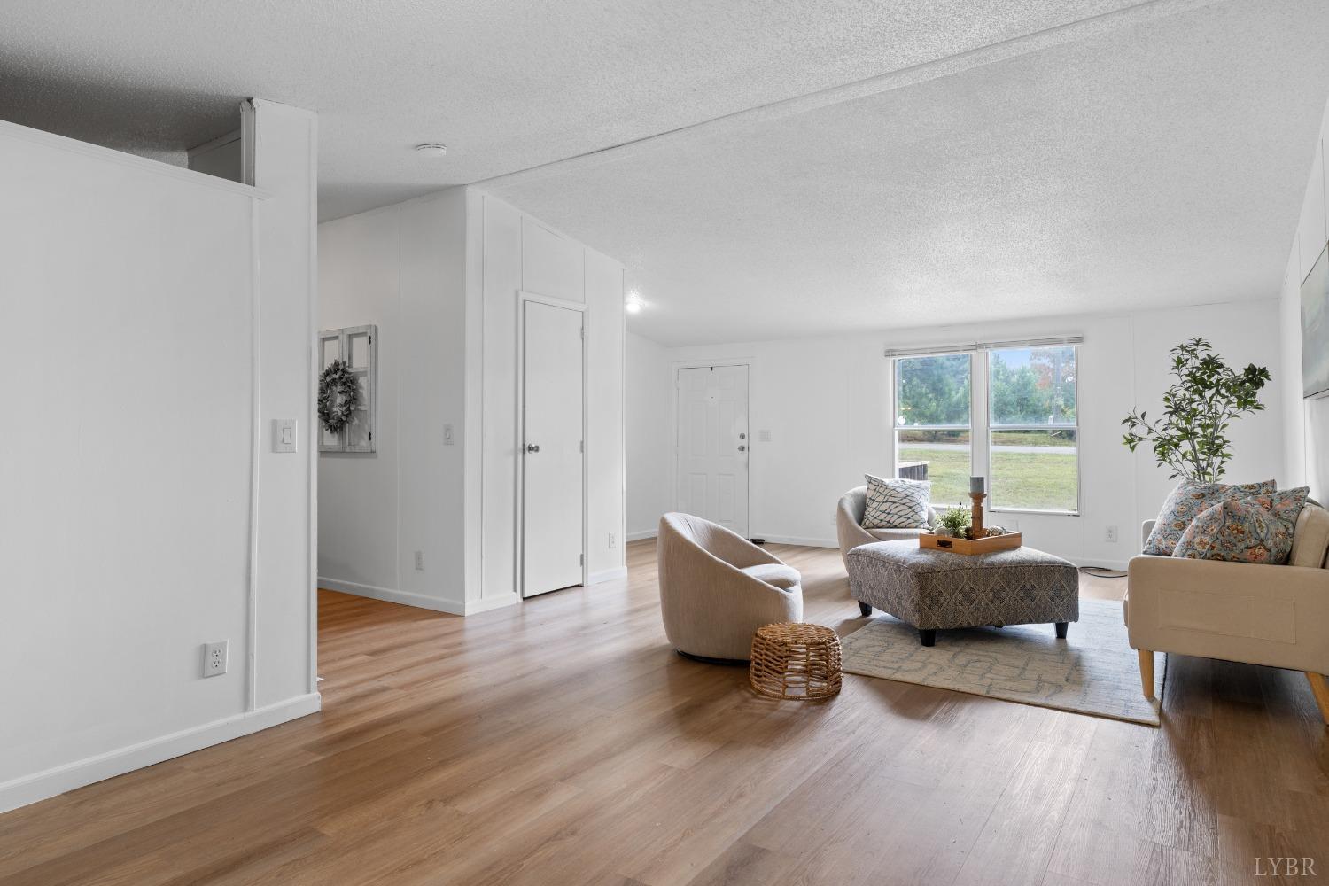 128 Douglas Drive Dry Fork, VA 24549 - Photo 5 of 45 a living room with furniture and a hard wood floor
