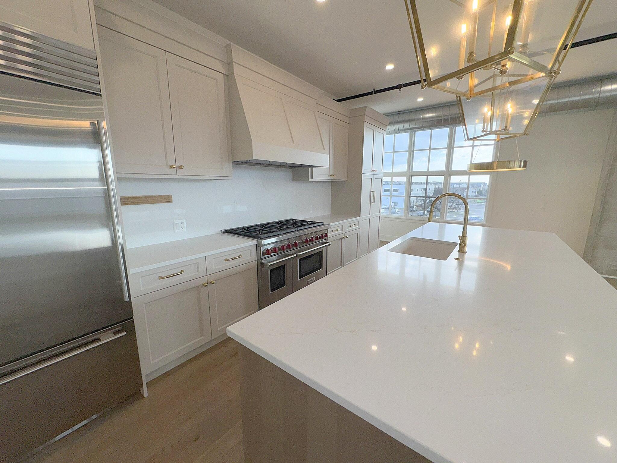 2051 Villa Road, Unit 302 Birmingham, MI 48009 - Photo 11 of 36 Stunning Quartz Counters