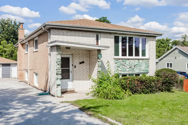 front view of house with a yard