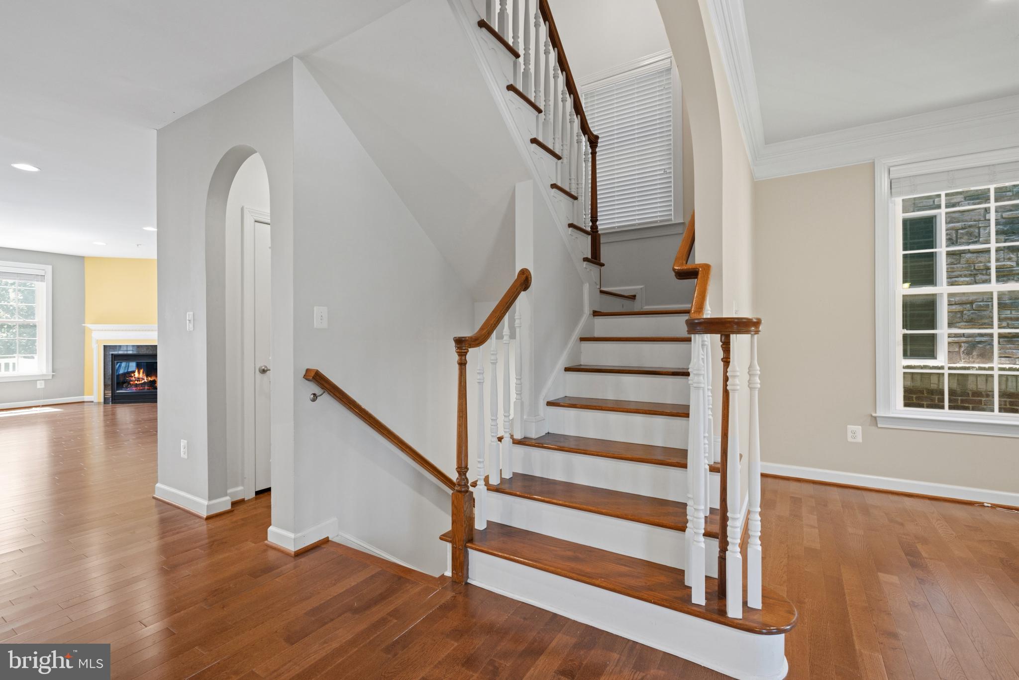 493 Watkins Mill Road Gaithersburg, MD 20878 - Photo 12 of 59 Elegant staircase in a bright foyer.